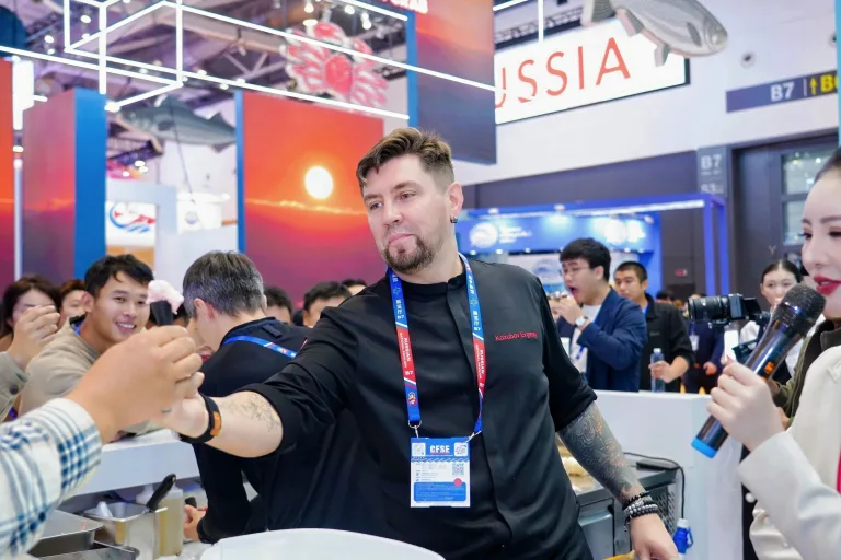Chef Evgeny Kozubov at the Russian Crab Group booth during the China Fisheries and Seafood Expo