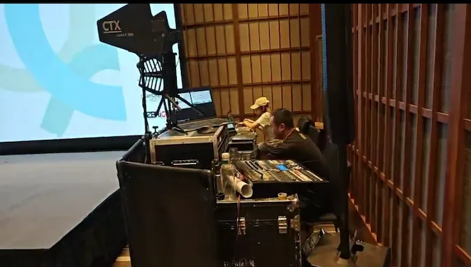 HI-COM equipment for bidirectional English-Chinese AI simultaneous translation and live captioning in Shanghai