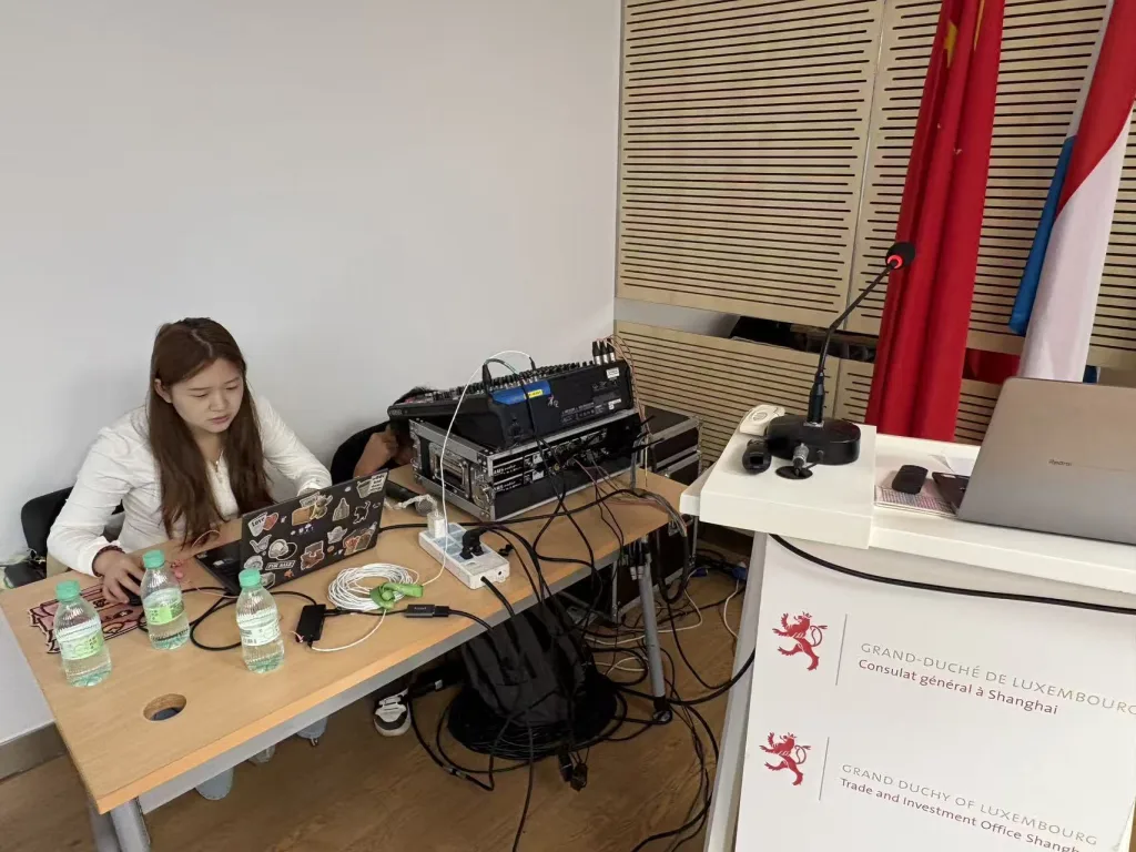 Audio and live captioning system testing before a multilingual corporate event in Shanghai