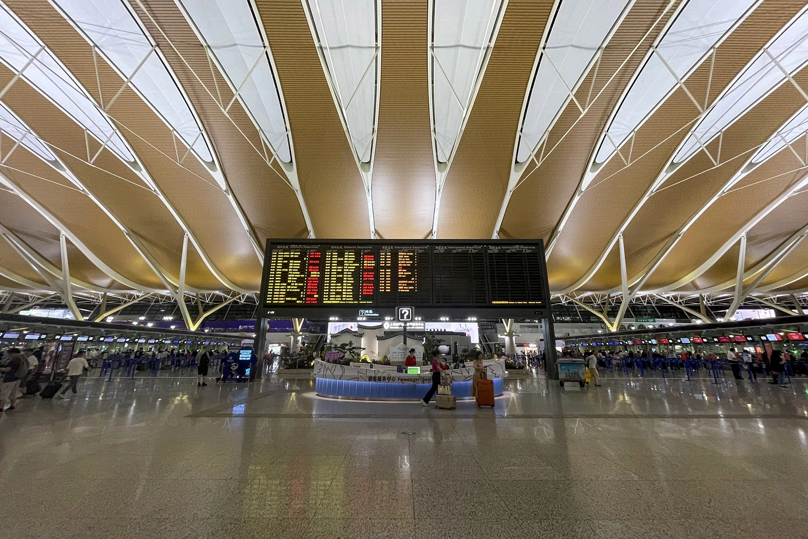 Departure hall at Shanghai Pudong International Airport Terminal 2, photographed in July 2023.